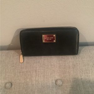 Michael Kors black leather zip around wallet authentic